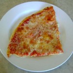 a slice peace of pizza serve on a white plate