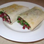 sliced bean cilantro wraps in white plate