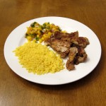 fried catfish nuggets with yellow rice and mango salsa