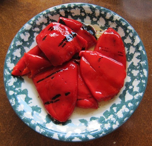 marinated roasted red peppers on a plate