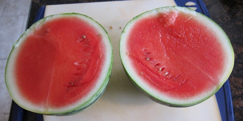 red juicy watermelon cut in half