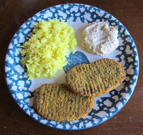 hummus with veggies patties and yellow rice