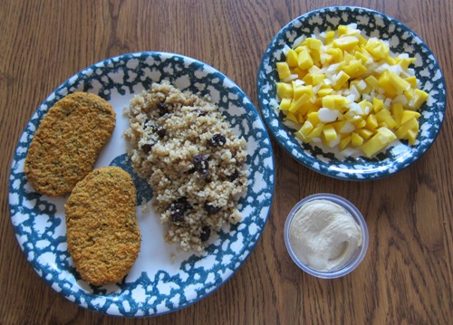 Vegetarian Dinner Of Veggie Patties With Hummus, Quinoa And Mango Salsa