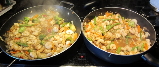 shrimp and veggie stir fry in 2 frying pans