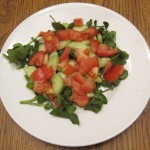 watercress salad on a plate