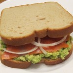 lox sandwich with avocado and onion