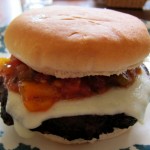 close-up of back bean cheese burger.