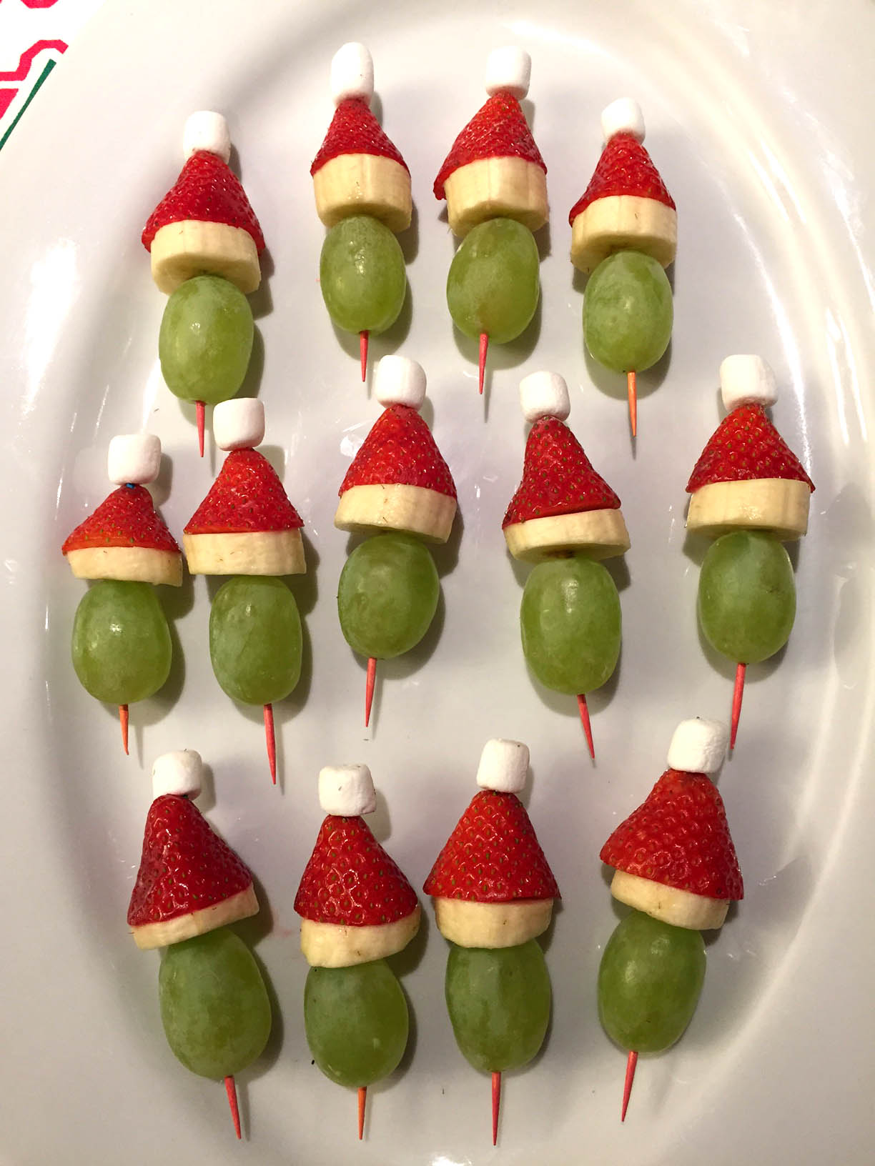 Easy Grinch Fruit Kabobs for the holidays- Amee's Savory Dish