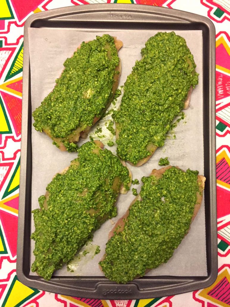 Spread chicken with pesto sauce