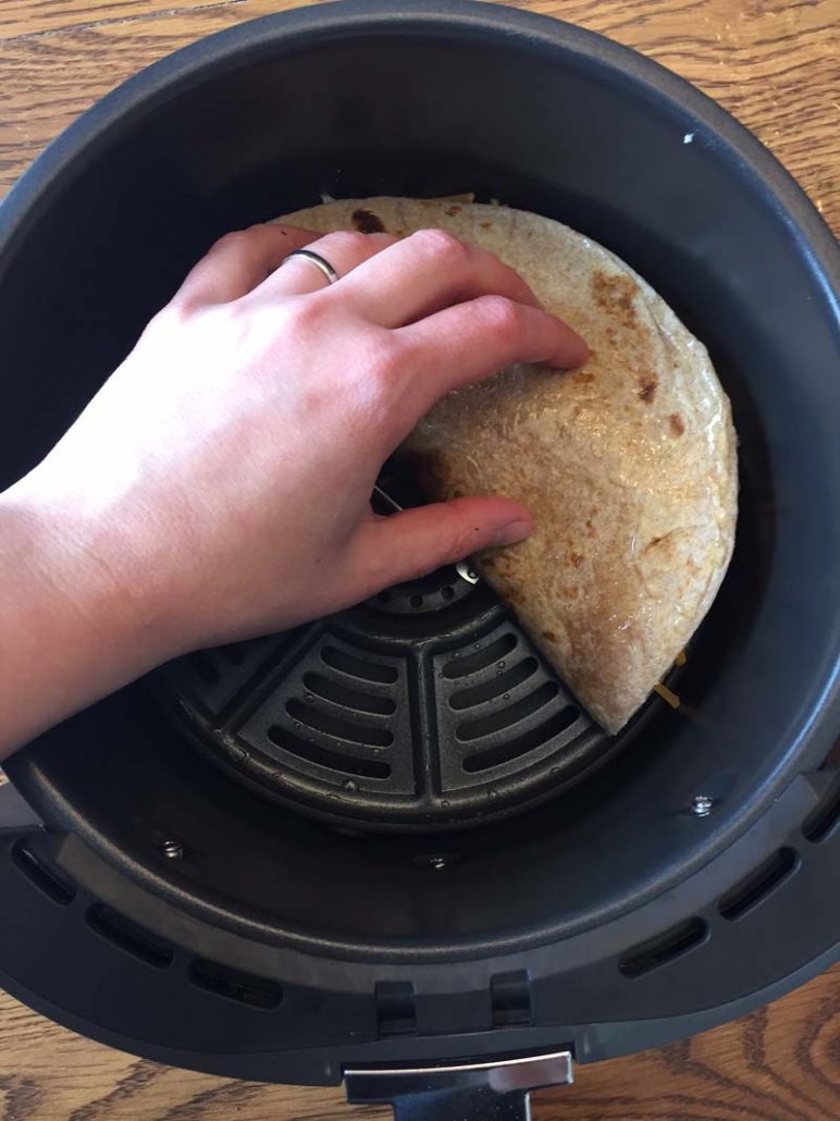 Folding the quesadilla