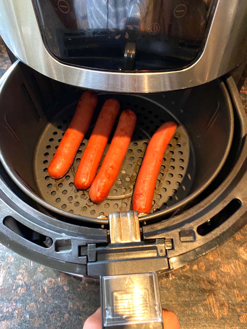 Four hot dog sausages