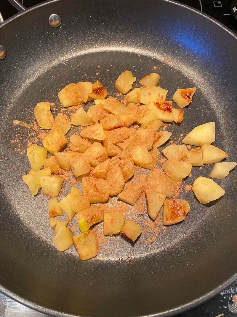 Apples browning in a pan