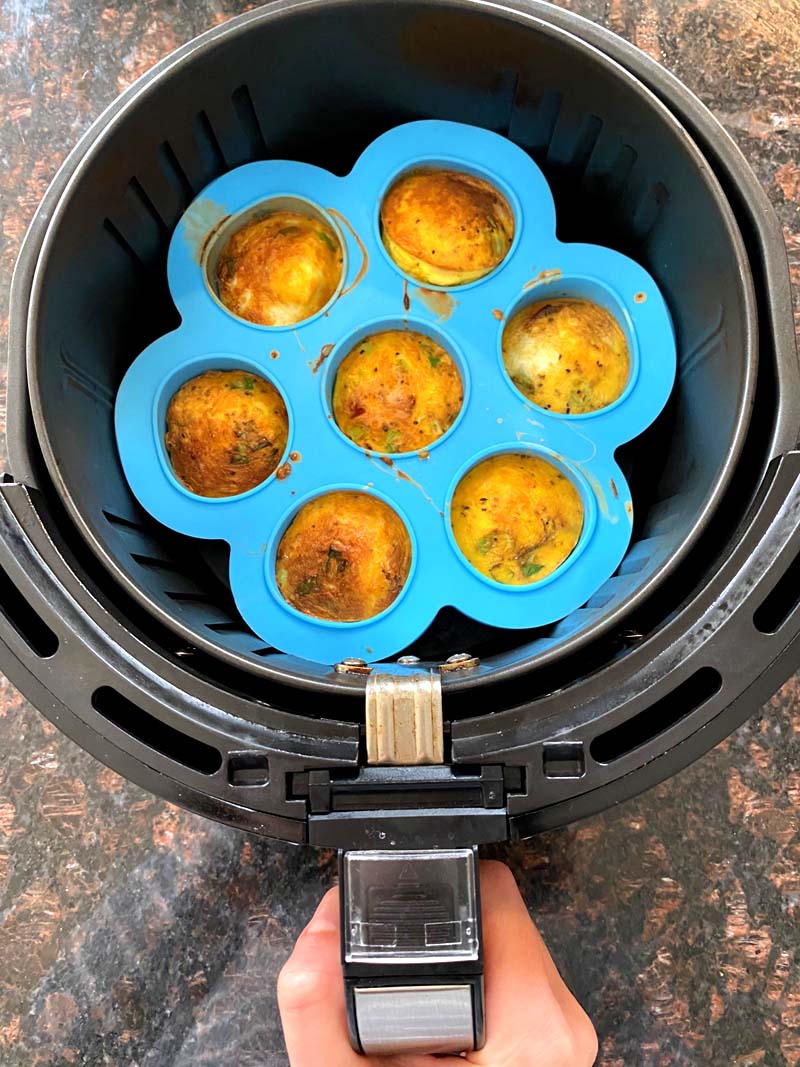 Removing the egg bites from the air fryer