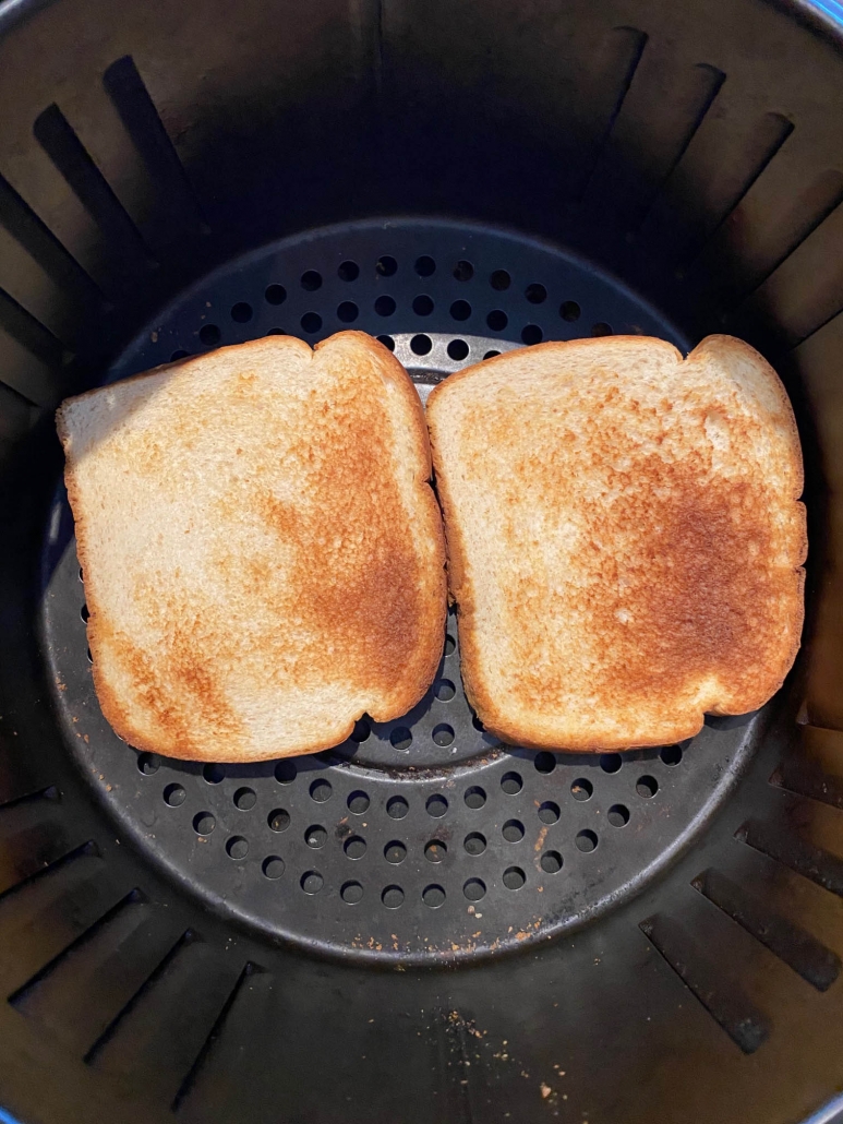 2 pieces of toast in air fryer basket 