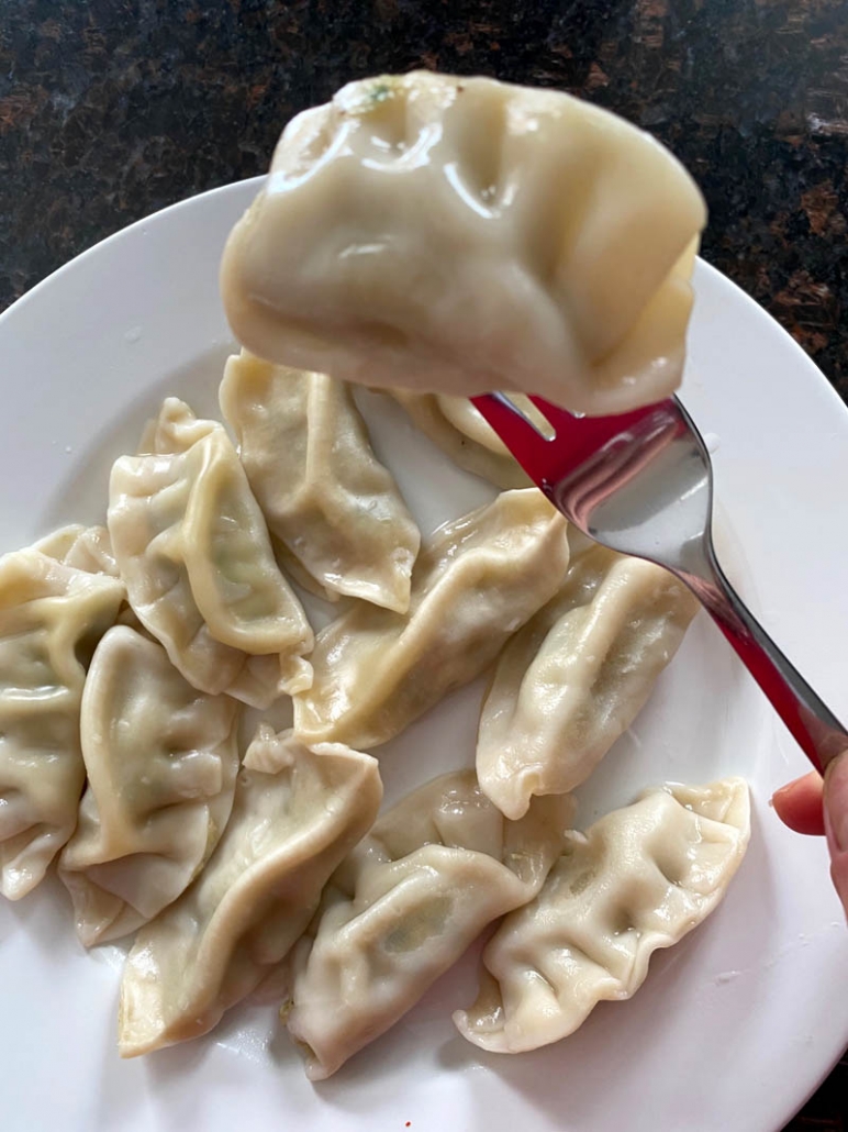 https://www.melaniecooks.com/wp-content/uploads/2021/03/frozen_potstickers_cook_instantpot-772x1030.jpg