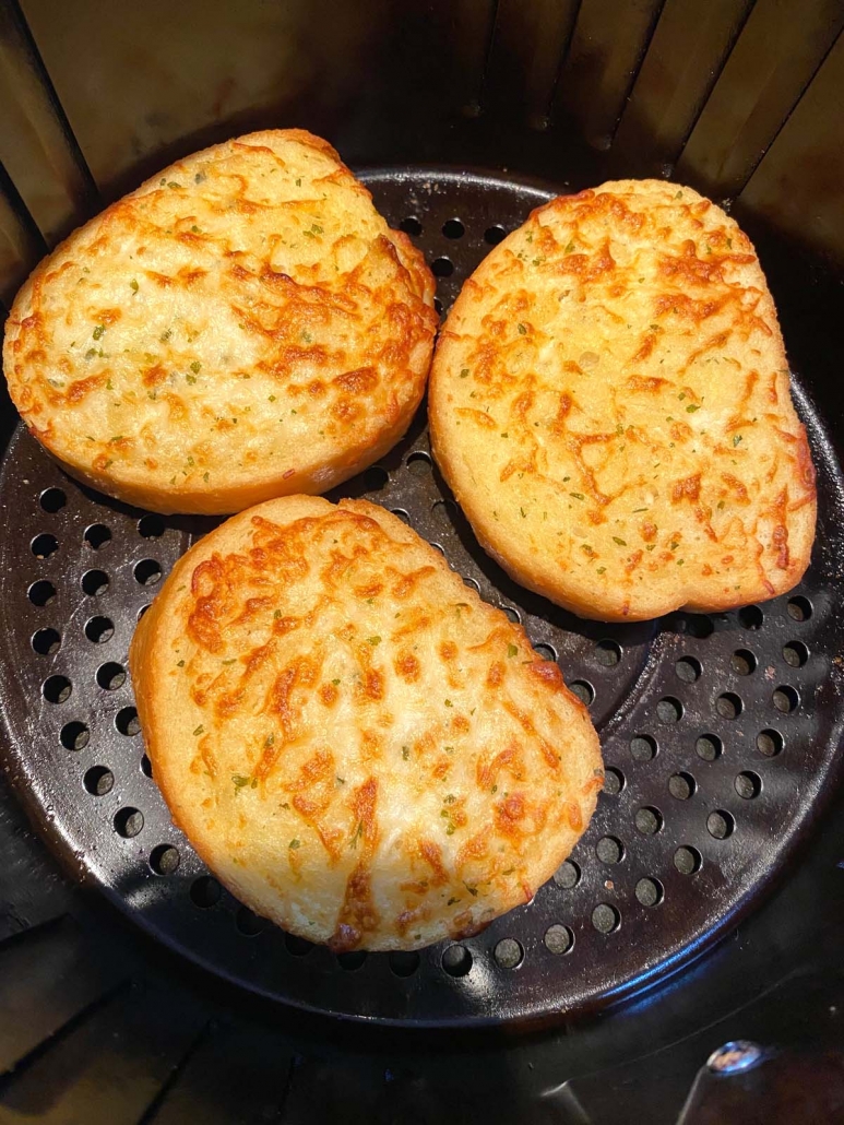 close up of 3 pieces of texas toast in air fryer