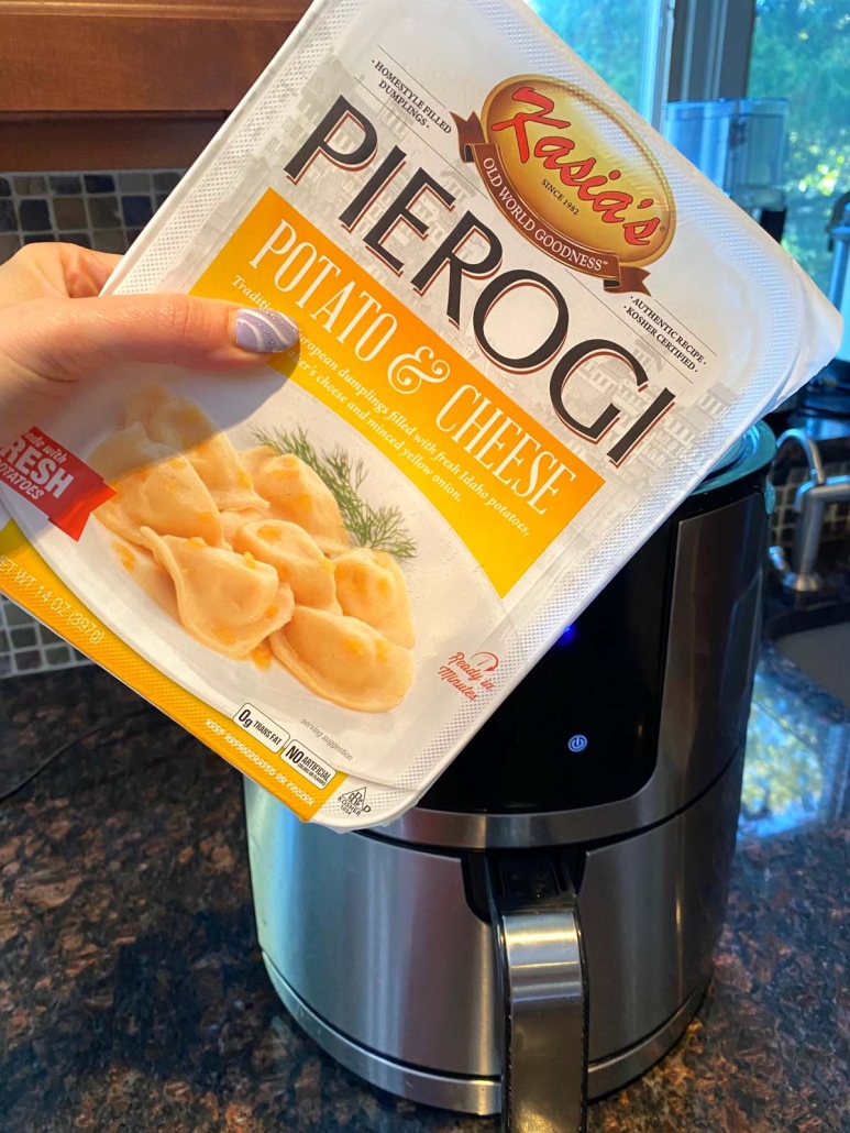 package of frozen pierogies in front of air fryer