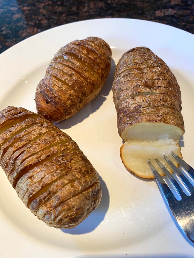 hasselback potatoes on plate