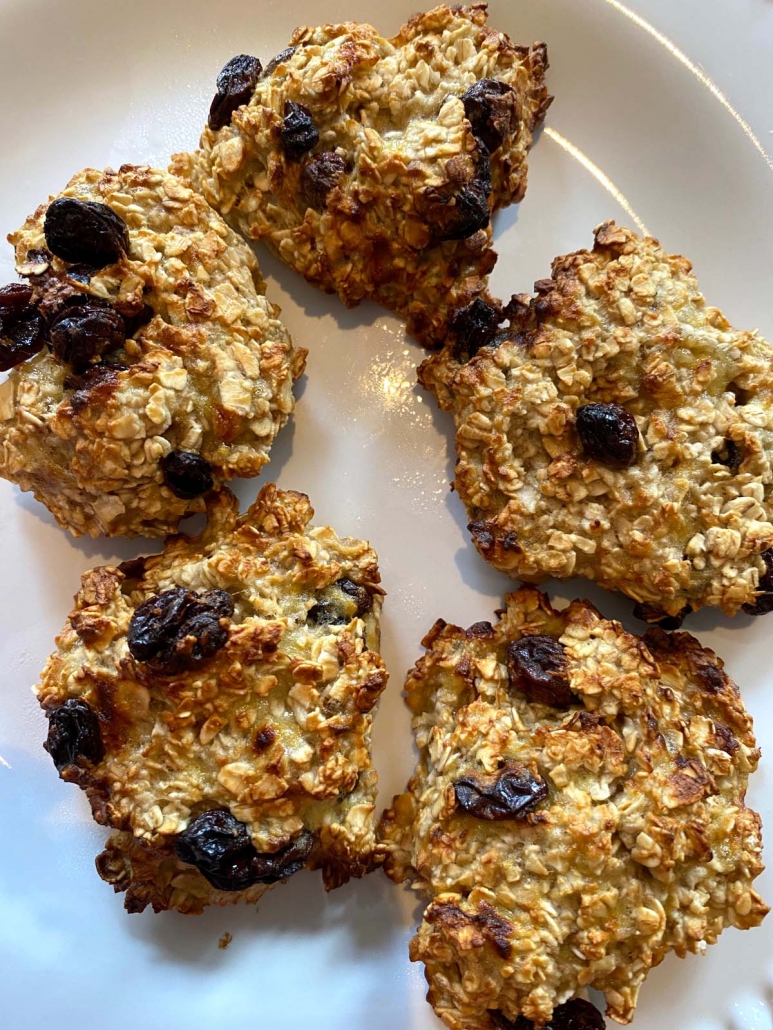 5 banana oatmeal raisin cookies on a plate