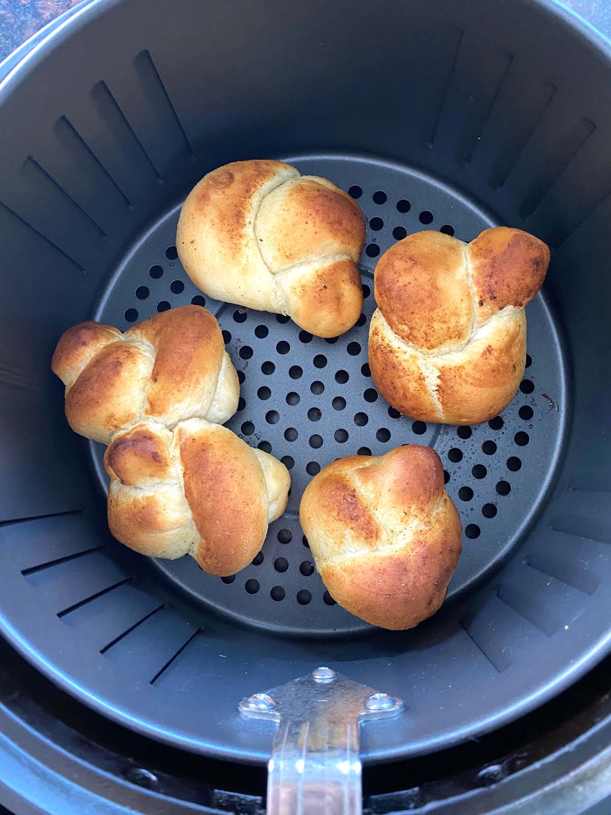 Baked garlic knots in an air fryer. 