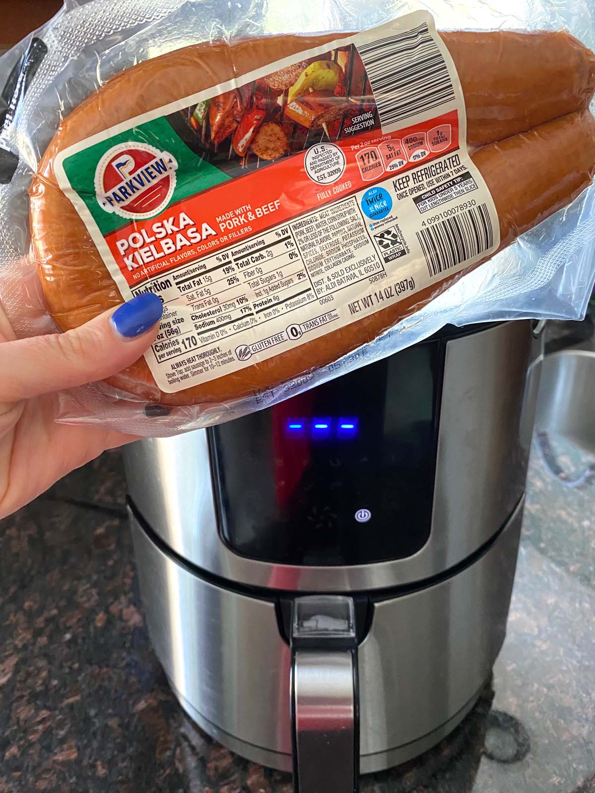 packaged kielbasa next to air fryer