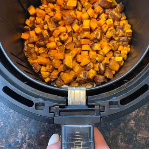 https://www.melaniecooks.com/wp-content/uploads/2022/06/air-fryer-diced-sweet-potatoes-3-500x500.jpg