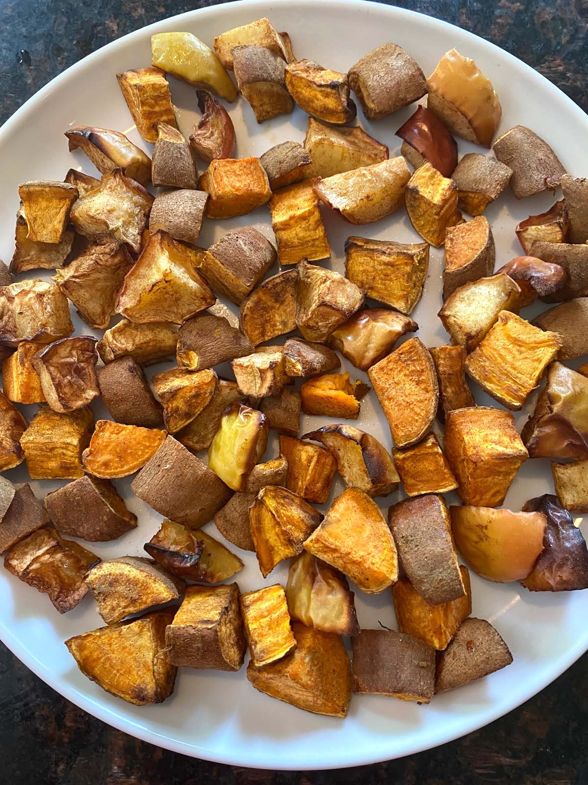 https://www.melaniecooks.com/wp-content/uploads/2022/09/Air-Fryer-Sweet-Potatoes-And-Apples-5.jpg