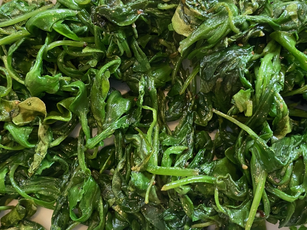 close-up of sautéed arugula