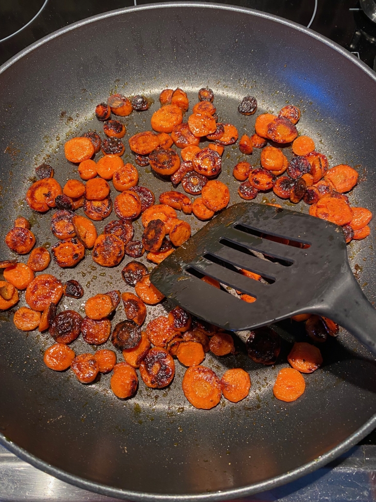 carrot slices in a skillet