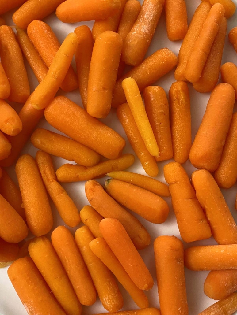 close-up of steamed carrots on a plate