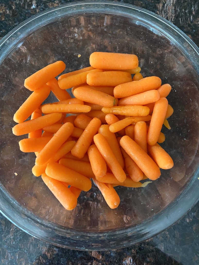steamed carrots in microwave-safe bowl