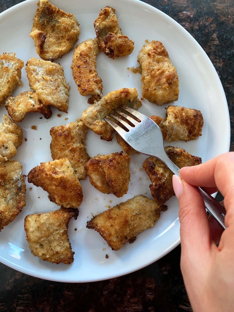 fork holding a catfish nugget