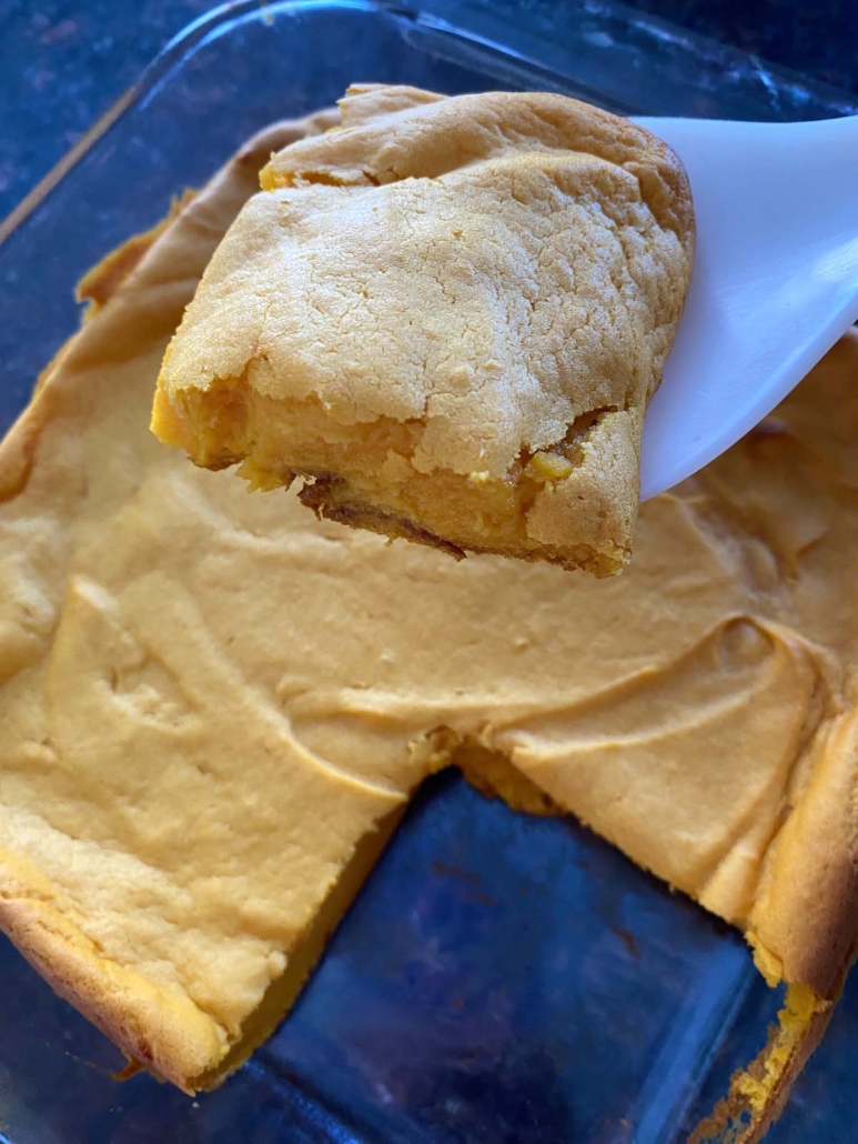 spatula holding slice of Sweet Potato Souffle