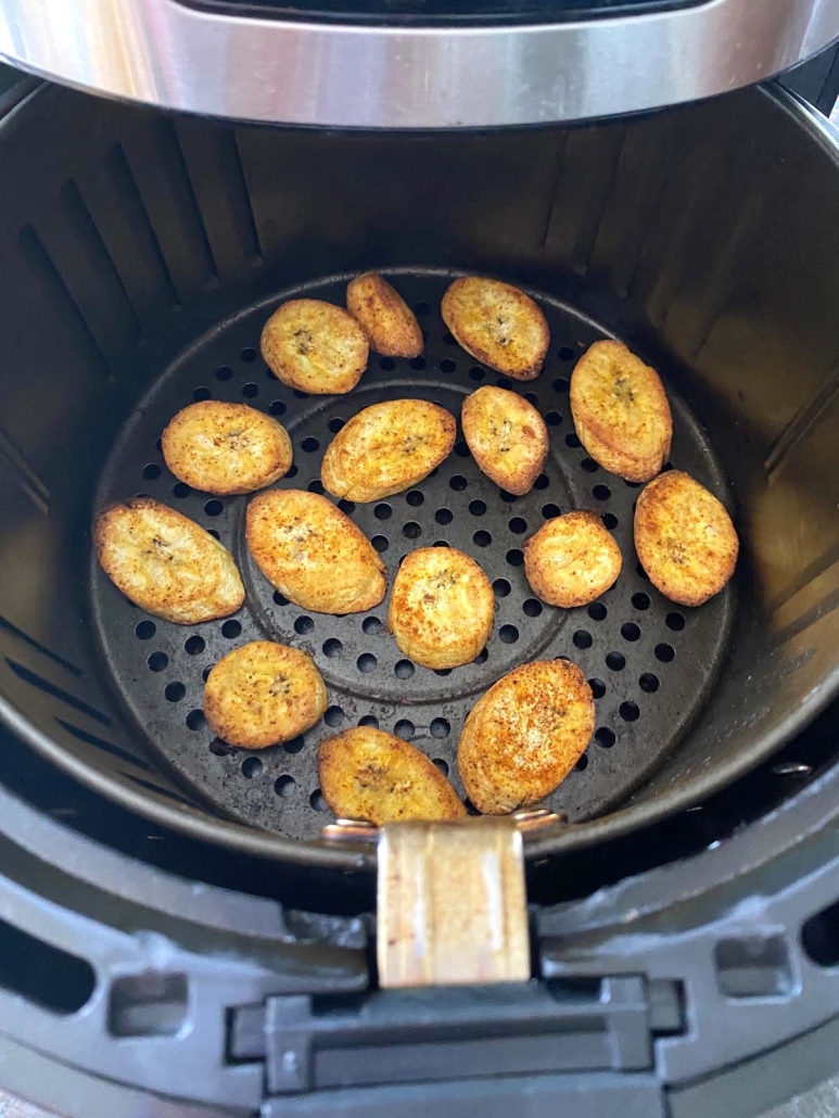 sliced plantains in an air fryer