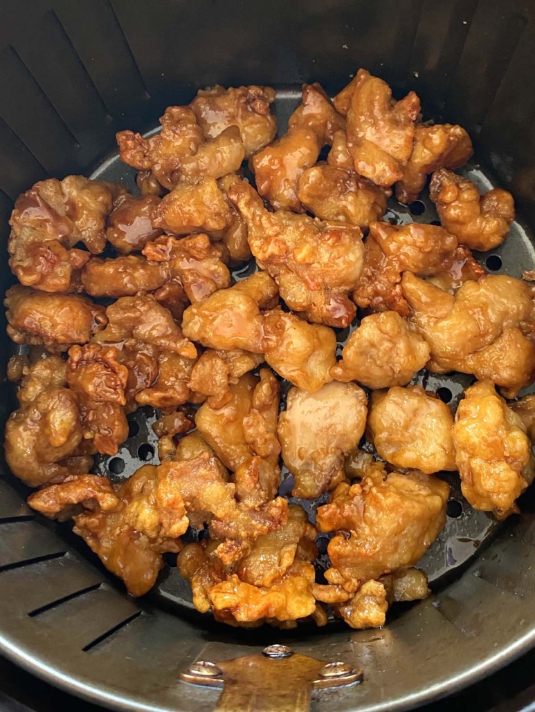 close-up of Air Fryer Trader Joe’s Orange Chicken in air fryer basket