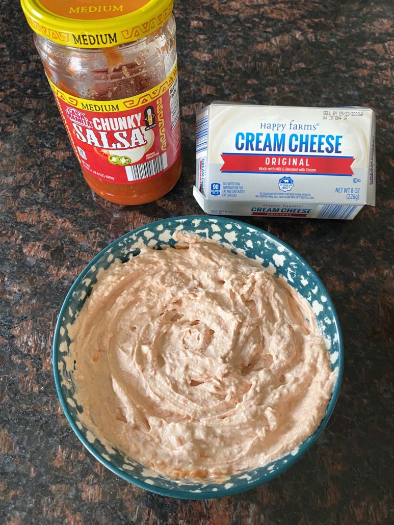 salsa and cream cheese next to a bowl of Cream Cheese And Salsa Dip