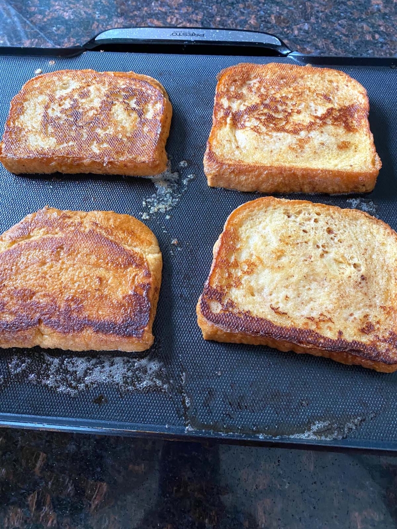 French Toast Without Eggs, cooking on a griddle