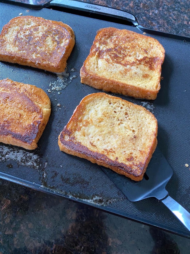 spatula flipping French Toast Without Eggs