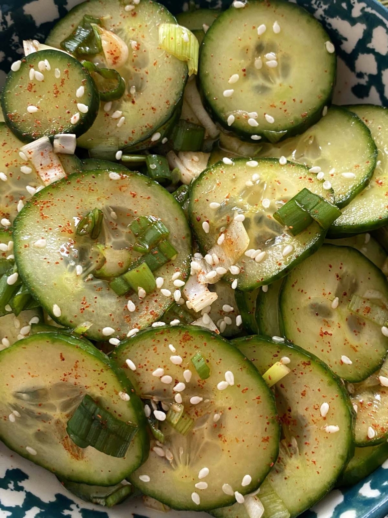 Korean Cucumber Salad topped with green onions and sesame seeds