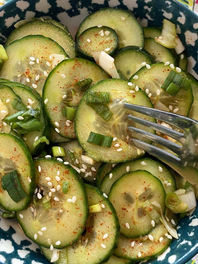 fork holding piece of cucumber in Korean Cucumber Salad