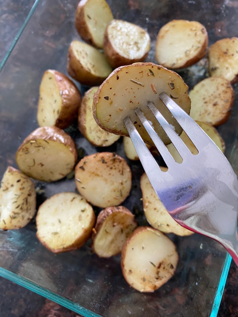 fork holding a piece of Red Potato