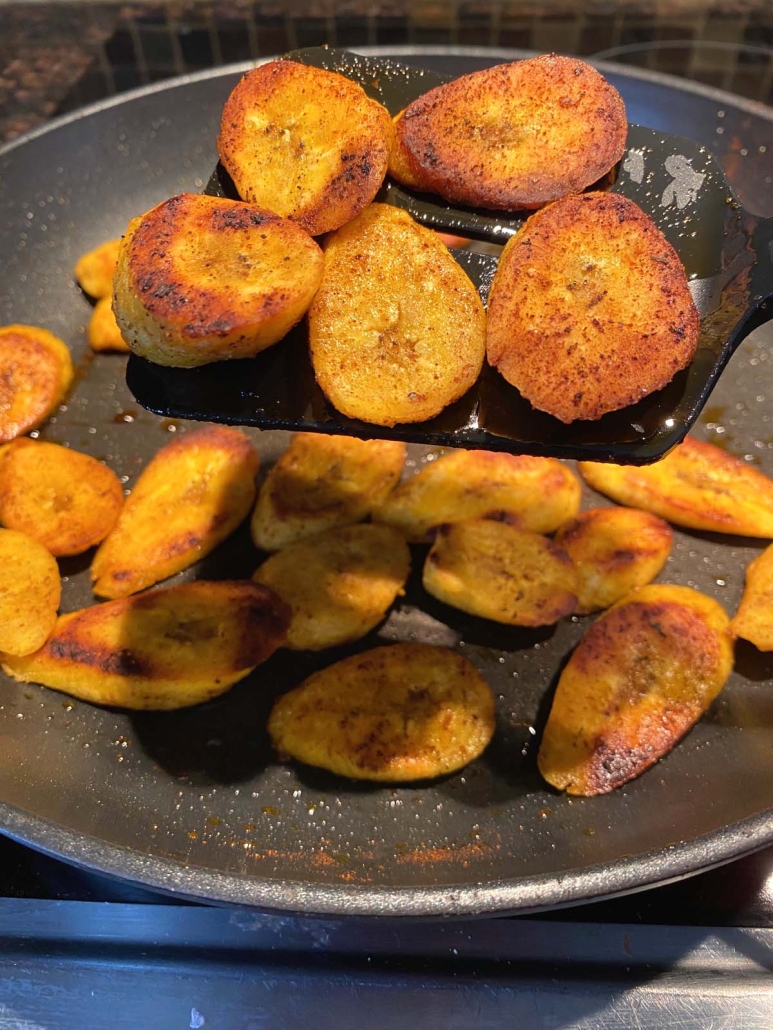 spatula holding Pan Fried Plantains