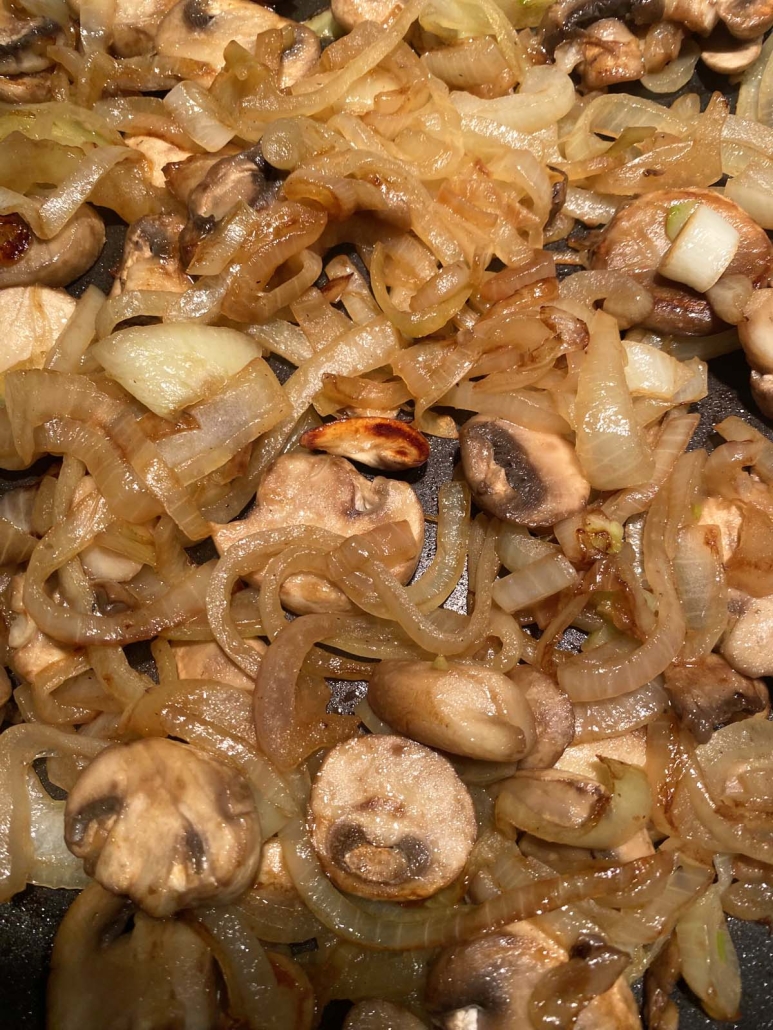 close-up of Sautéing Mushrooms And Onions