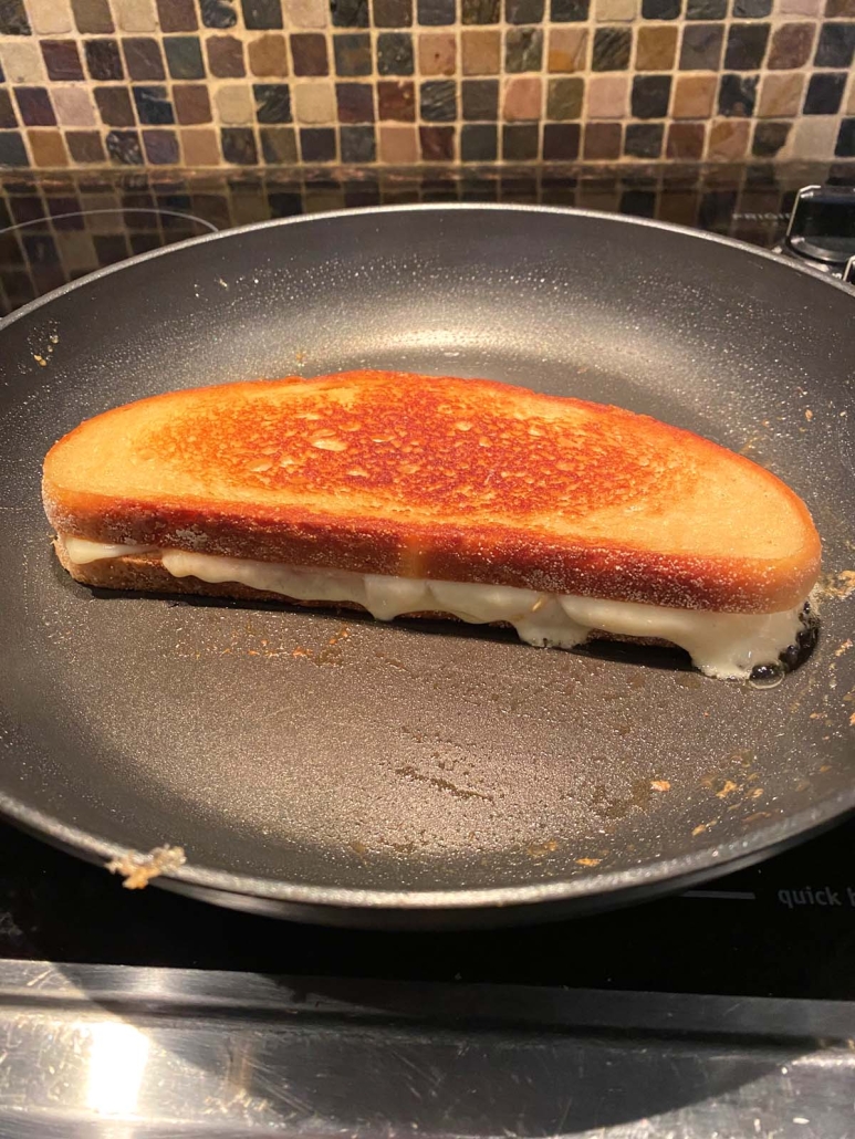 Starbucks Grilled Cheese Copycat sizzling in a skillet