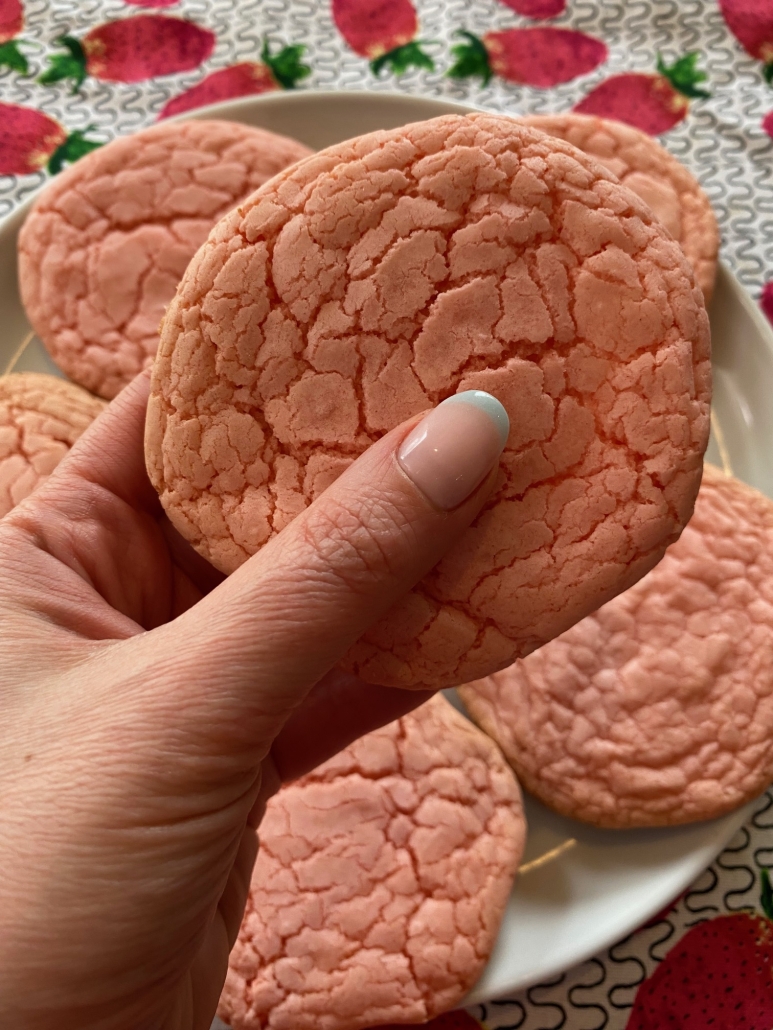 hand holding easy recipe Strawberry Cake Mix Cookie