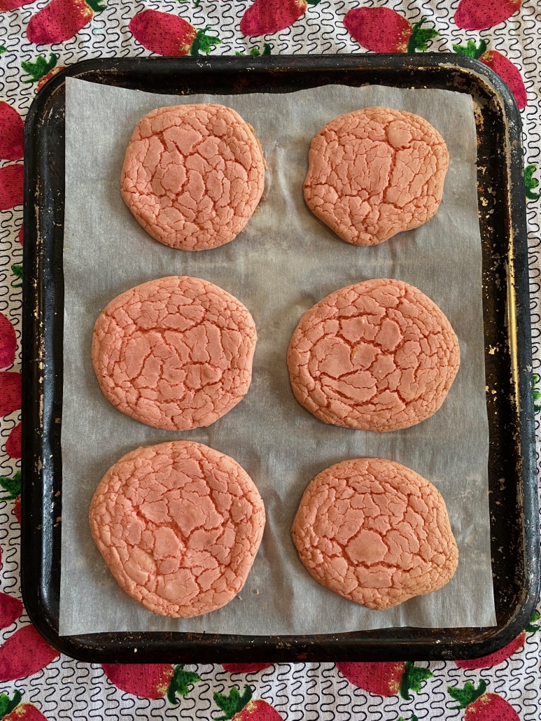 Strawberry Cake Mix Cookies on a baking sheet