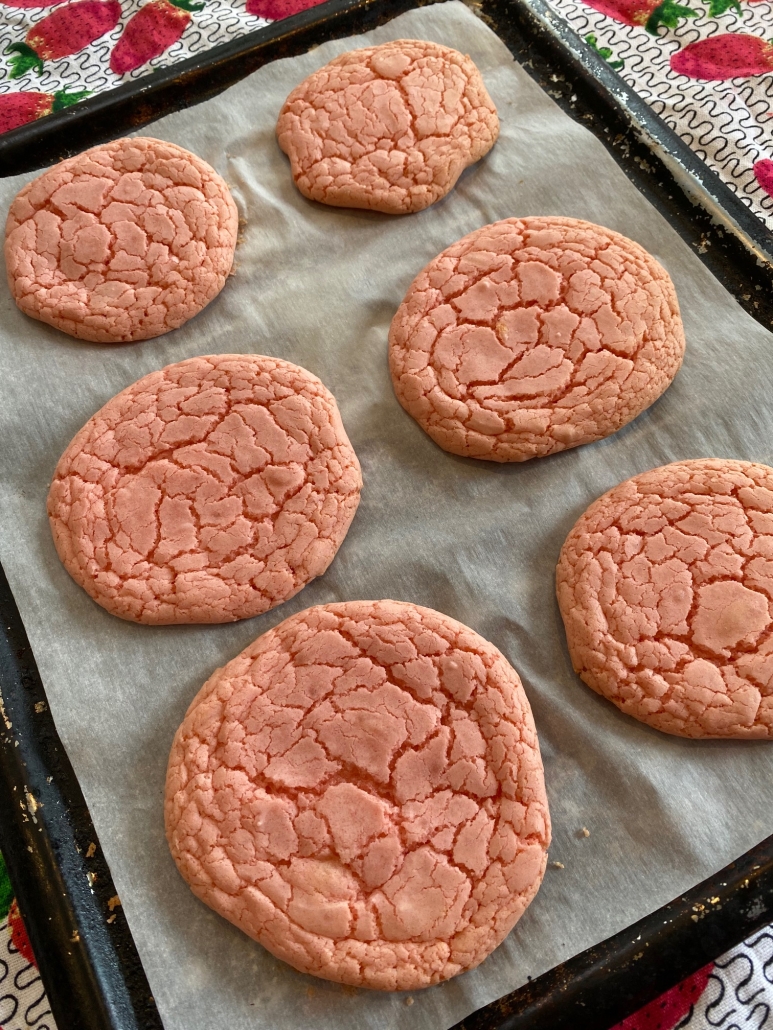 delicious strawberry cake mix cookies on a baking sheet