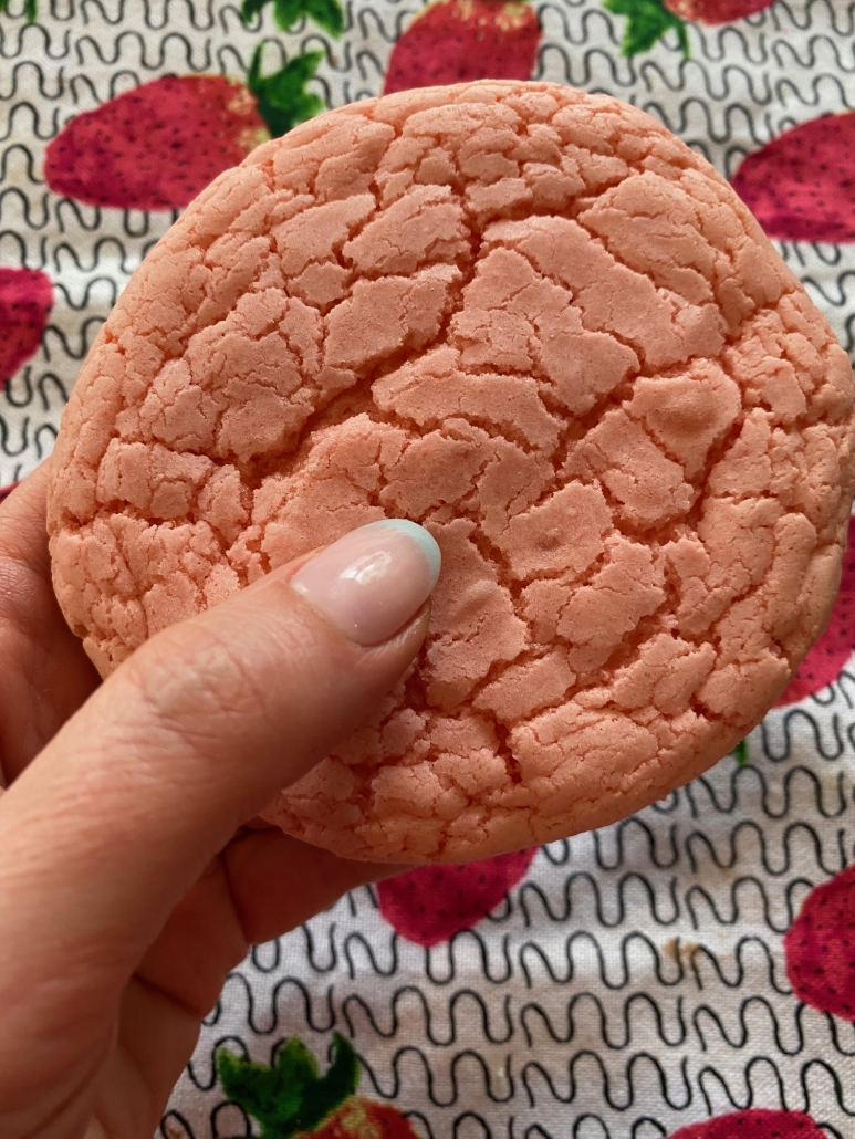 hand holding Strawberry Cake Mix Cookie