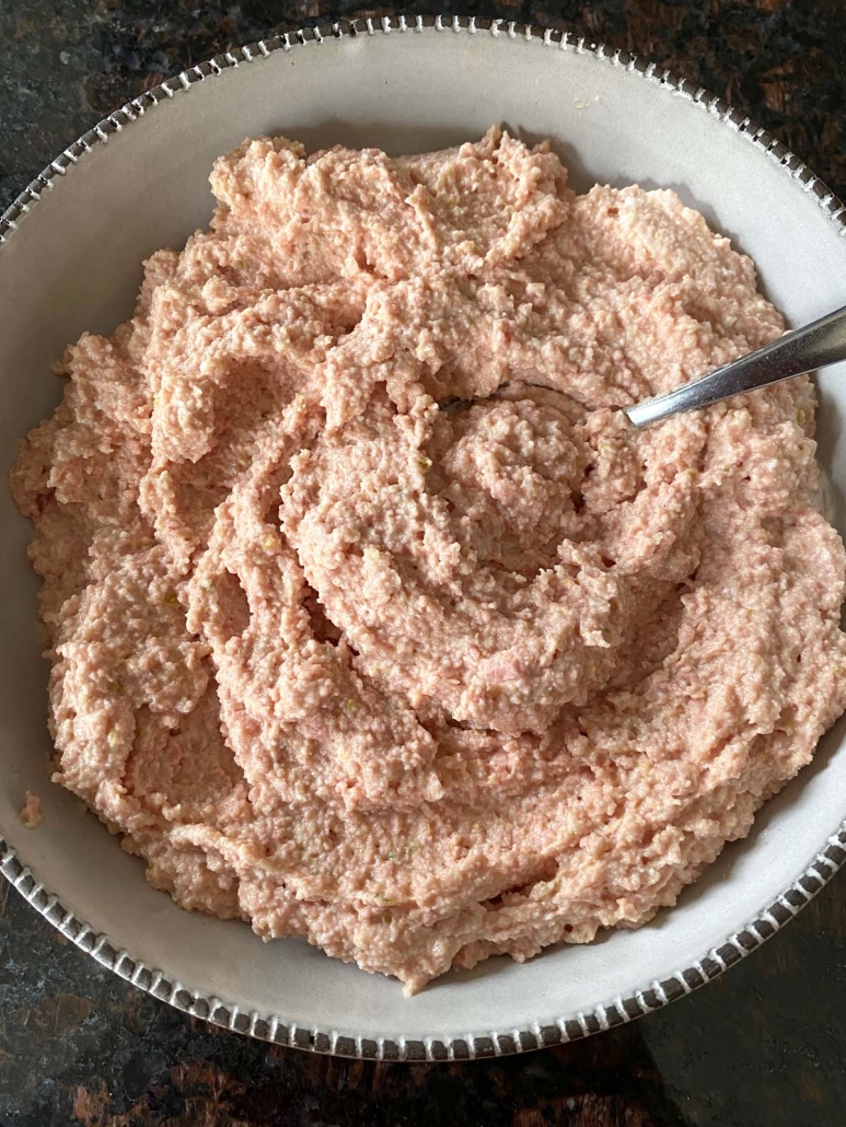 Bologna Salad in a bowl with a spoon to serve