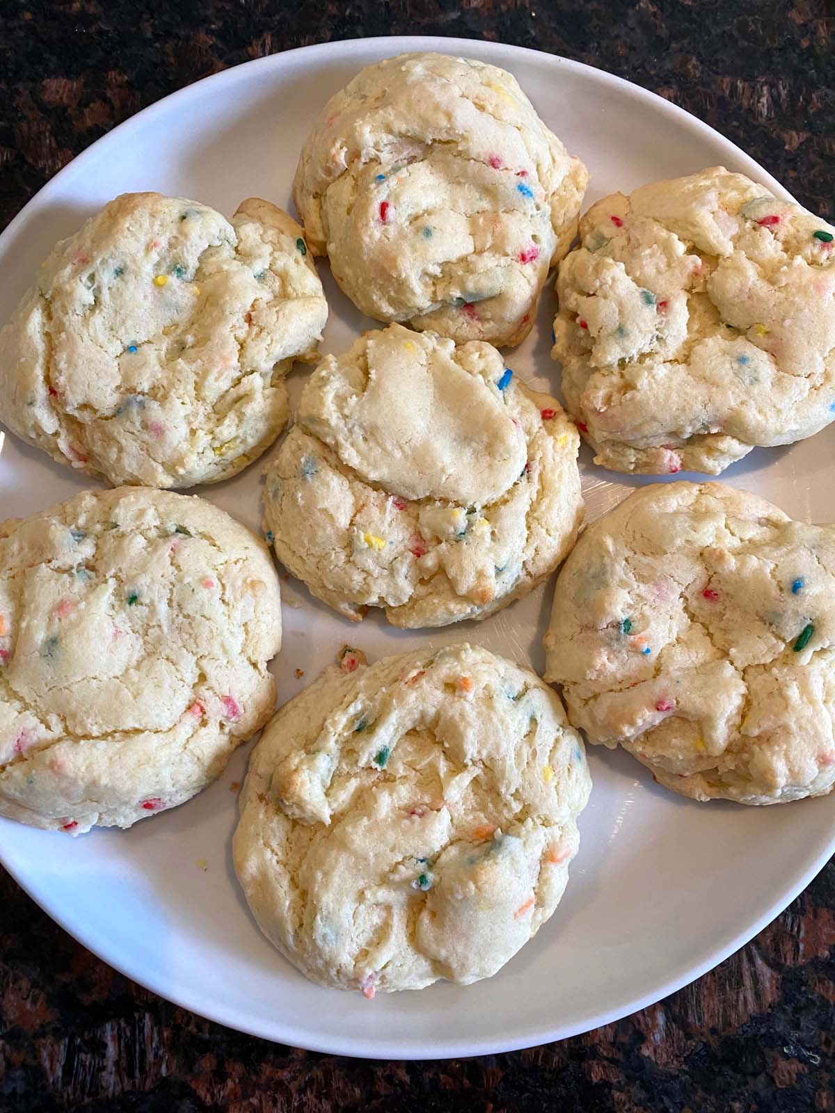 Funfetti cake mix cookies on a white plate.